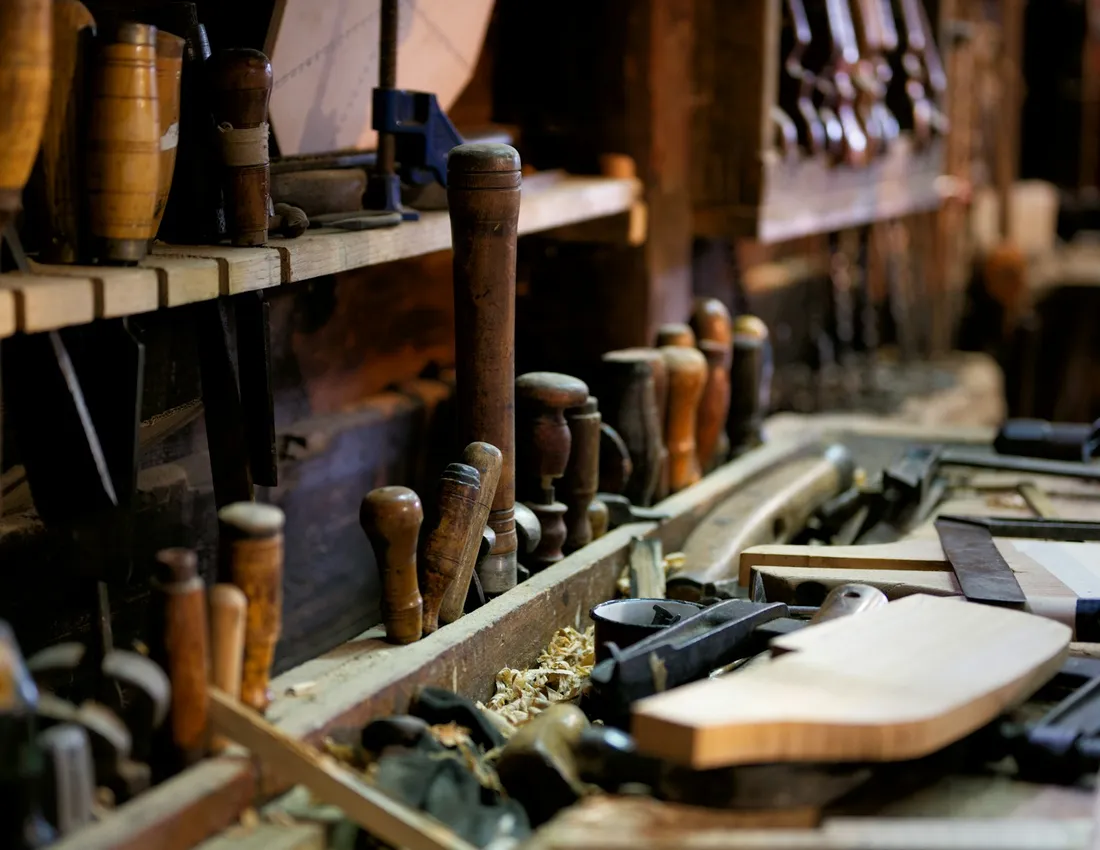 Woodworking tools laid out for the repair work